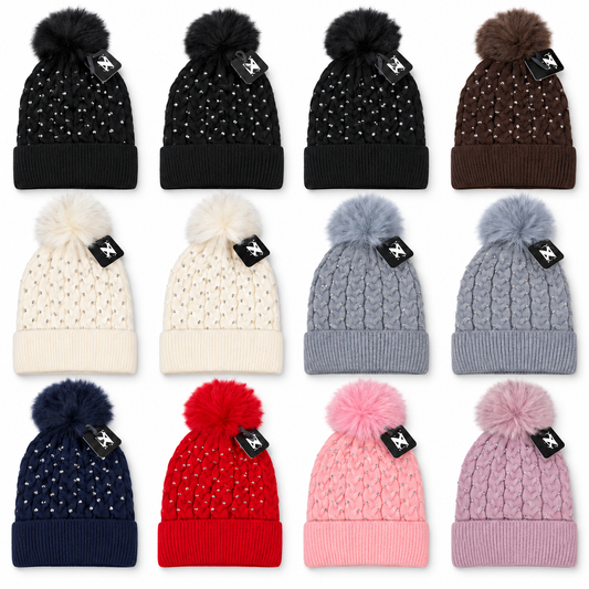 Twelve rhinestone cable-knit beanies with ribbed cuffs and fluffy pom-poms in assorted colors