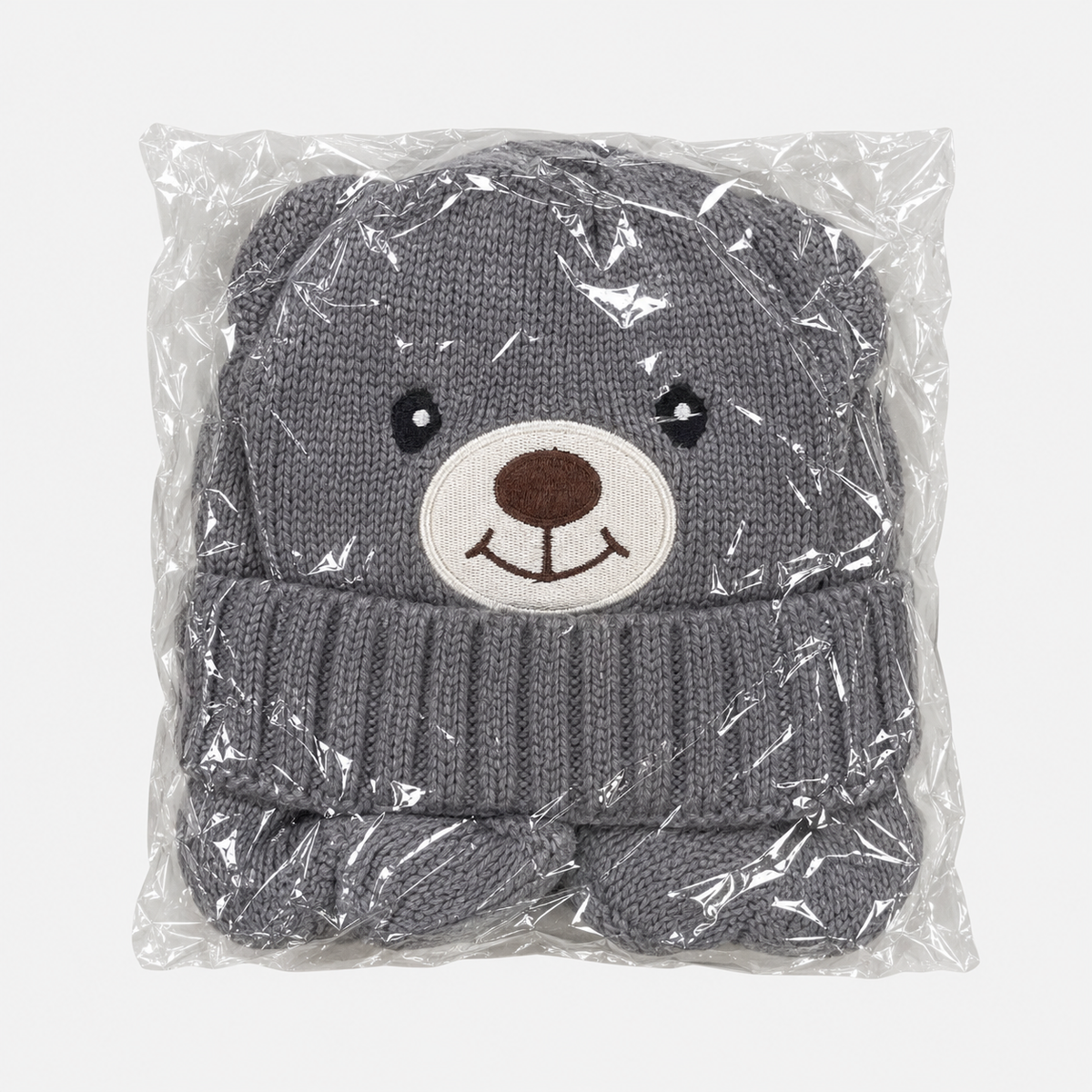 Gray bear knit hat in individual packaging