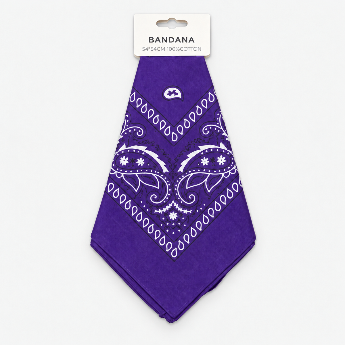One purple cotton paisley bandana with retail hang tag on a light gray background.