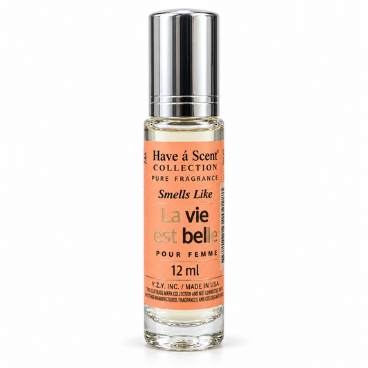 Have a Scent La Vie Est Belle-inspired 12 mL roll-on fragrance oil with peach label and silver cap on a white background