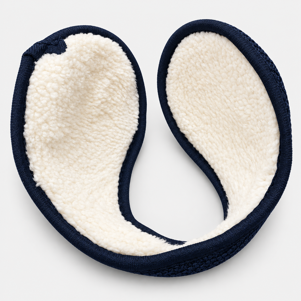 Cream fleece lining inside navy wraparound earmuffs