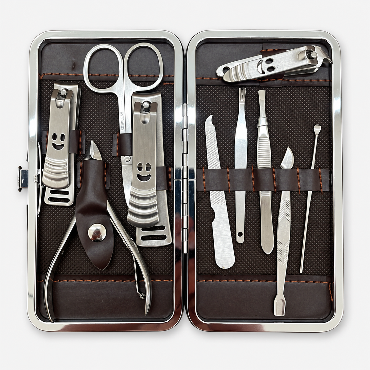 Open manicure case showing the included nail-care tools and individual holders.