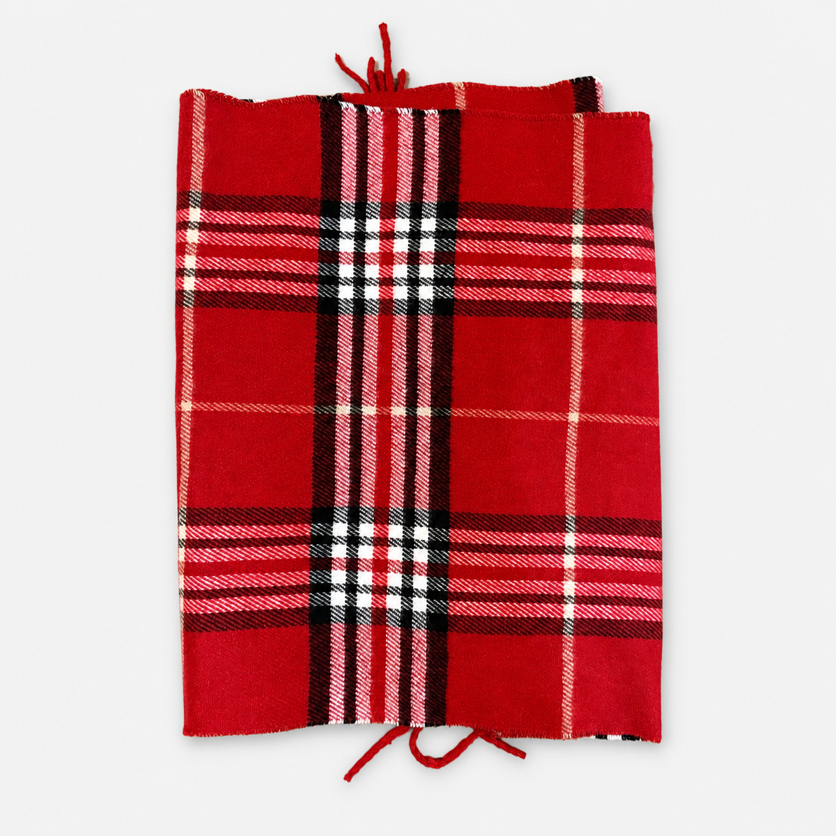 Red plaid fringe scarf, folded front view