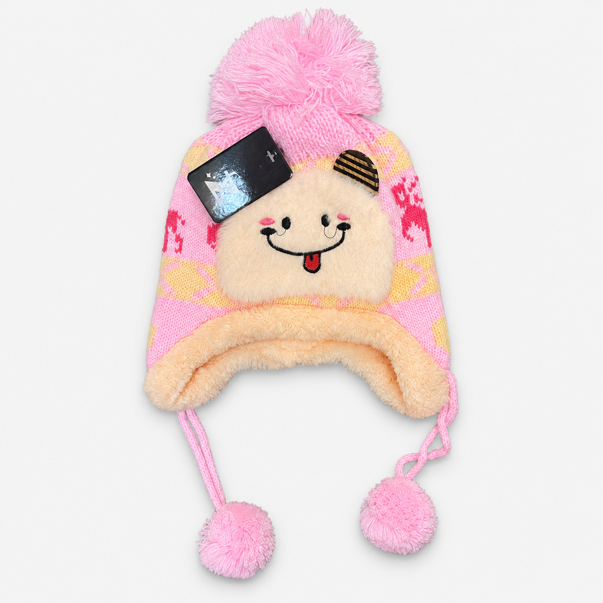 Light Pink smiley face knit earflap hat with plush trim and pom-pom ties