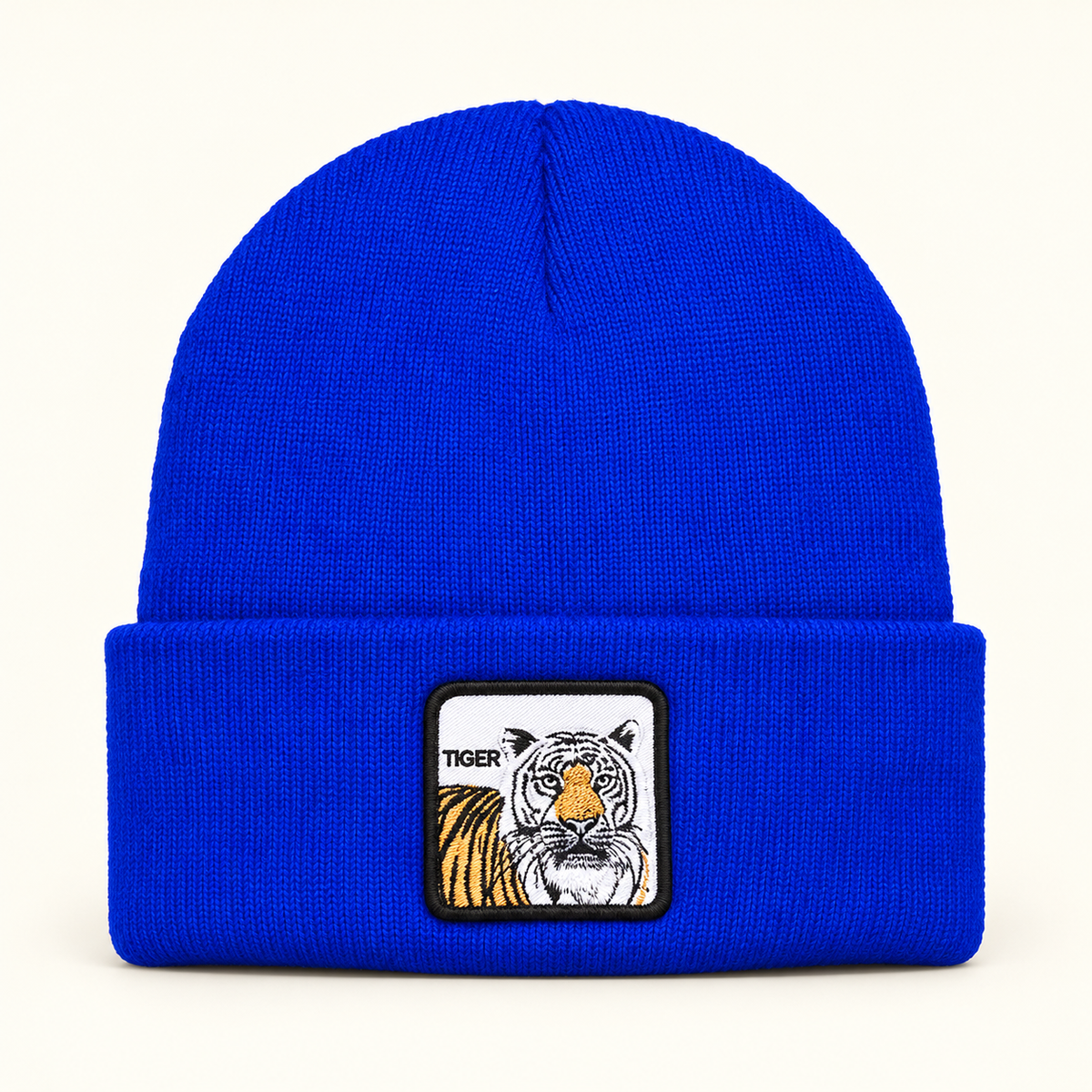 Gorros tejidos con parche de tigre — color: azul rey; pieza individual