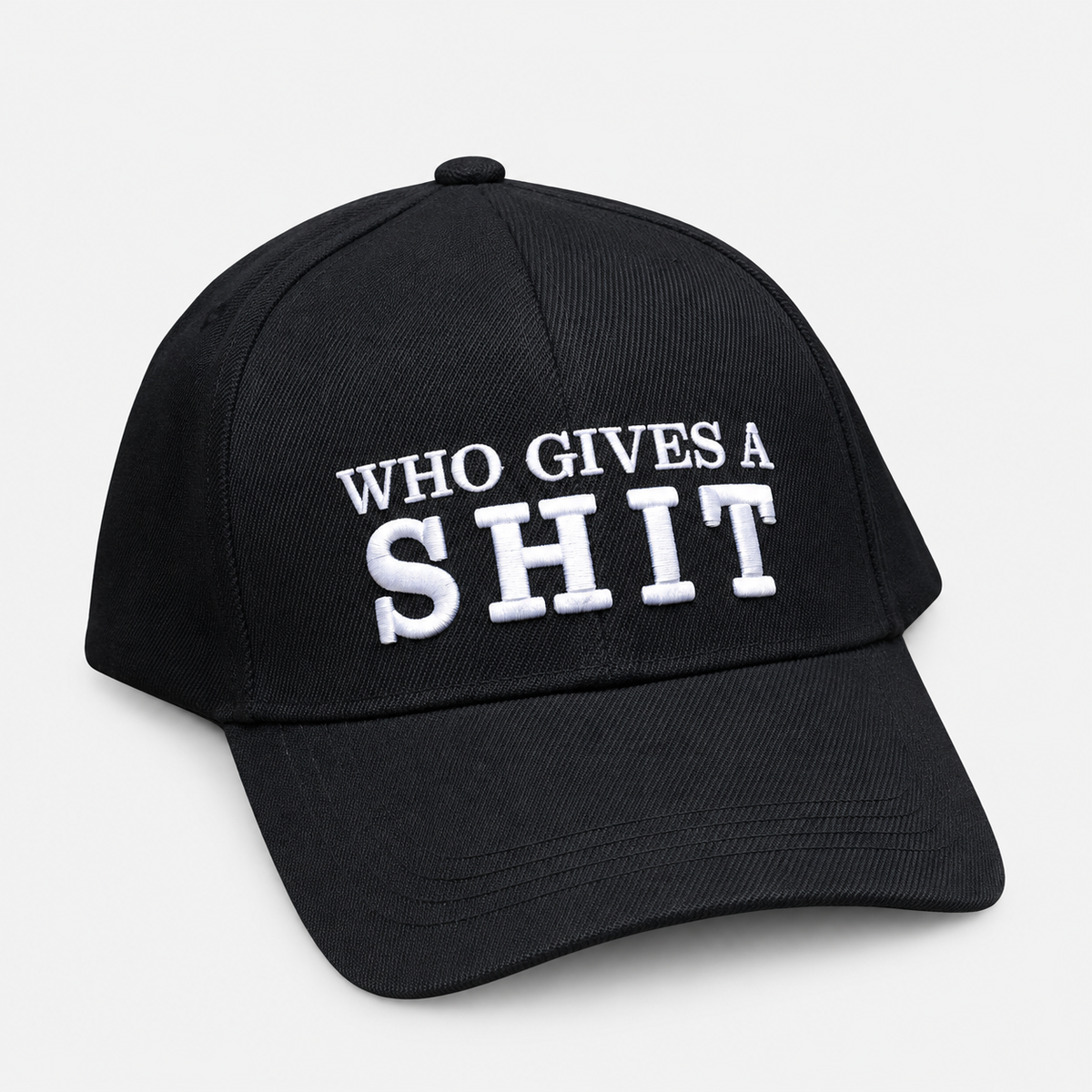 Black baseball cap with white Who Gives a Shit embroidery and a curved brim