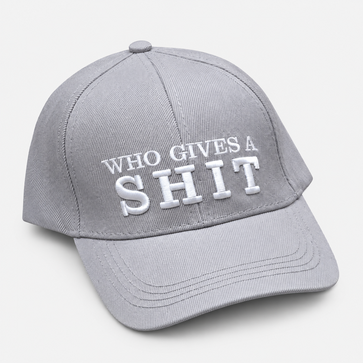 Light gray baseball cap with white Who Gives a Shit embroidery and a curved brim