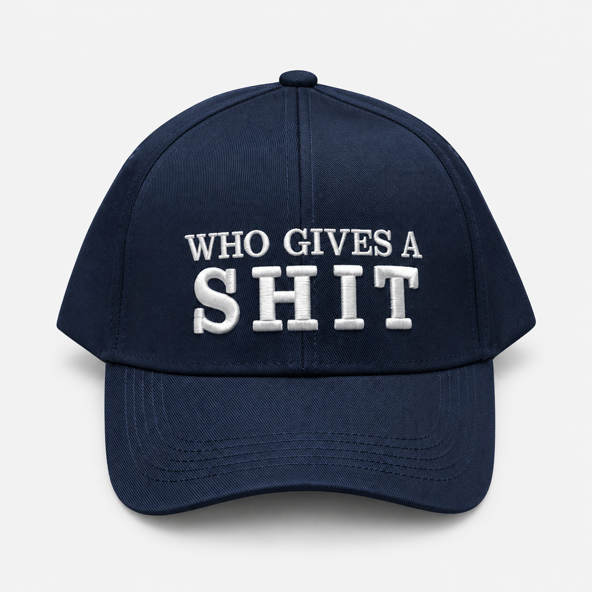 Navy baseball cap with white Who Gives a Shit embroidery and a curved brim