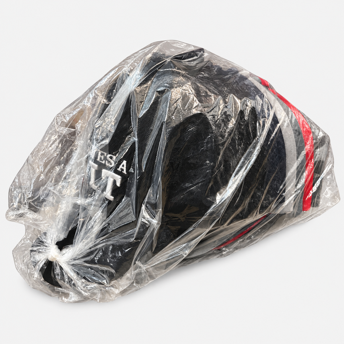 Side view of packaged dozen Who Gives a Shit caps