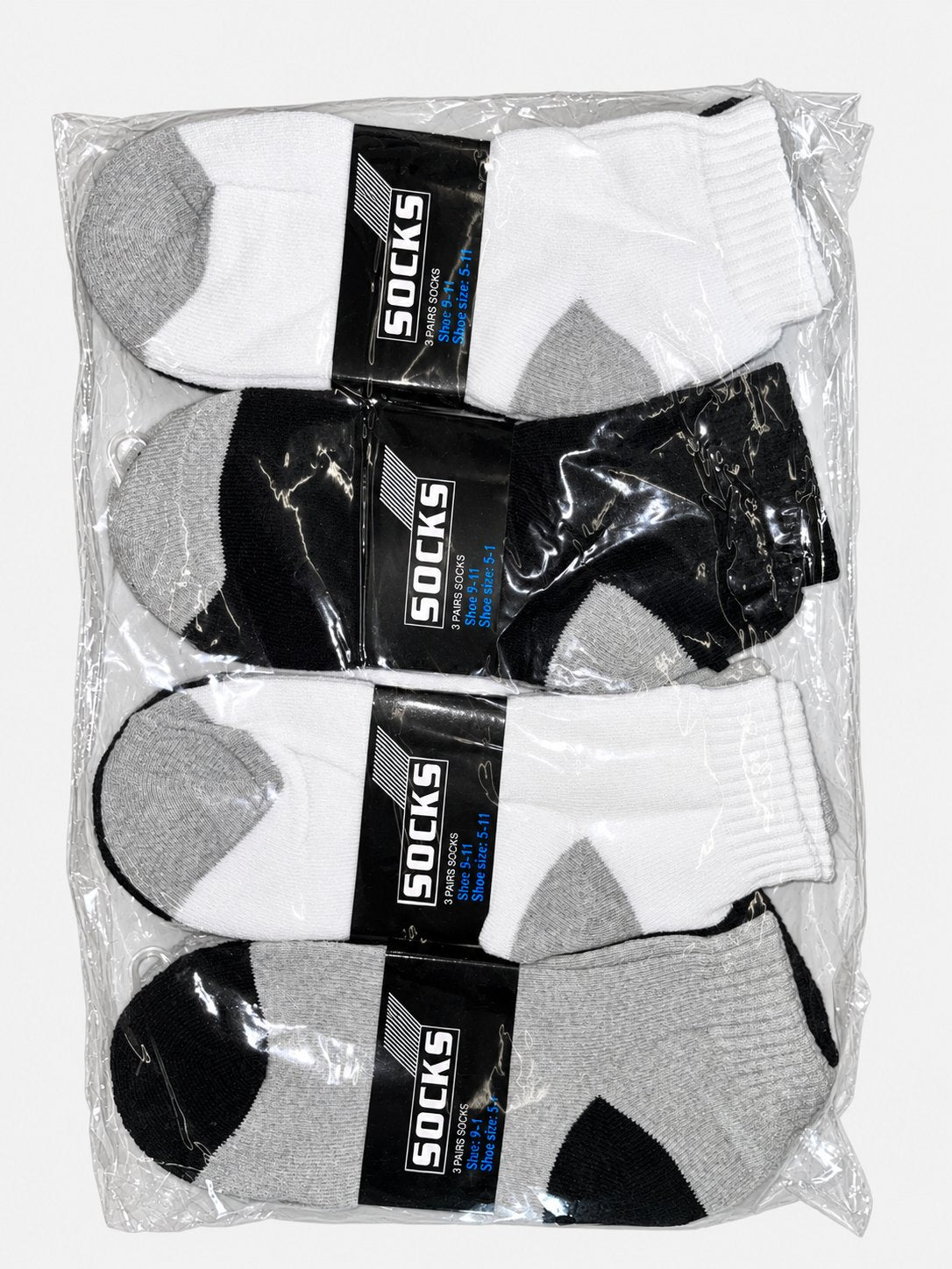 Assorted white, black and gray men’s ankle socks