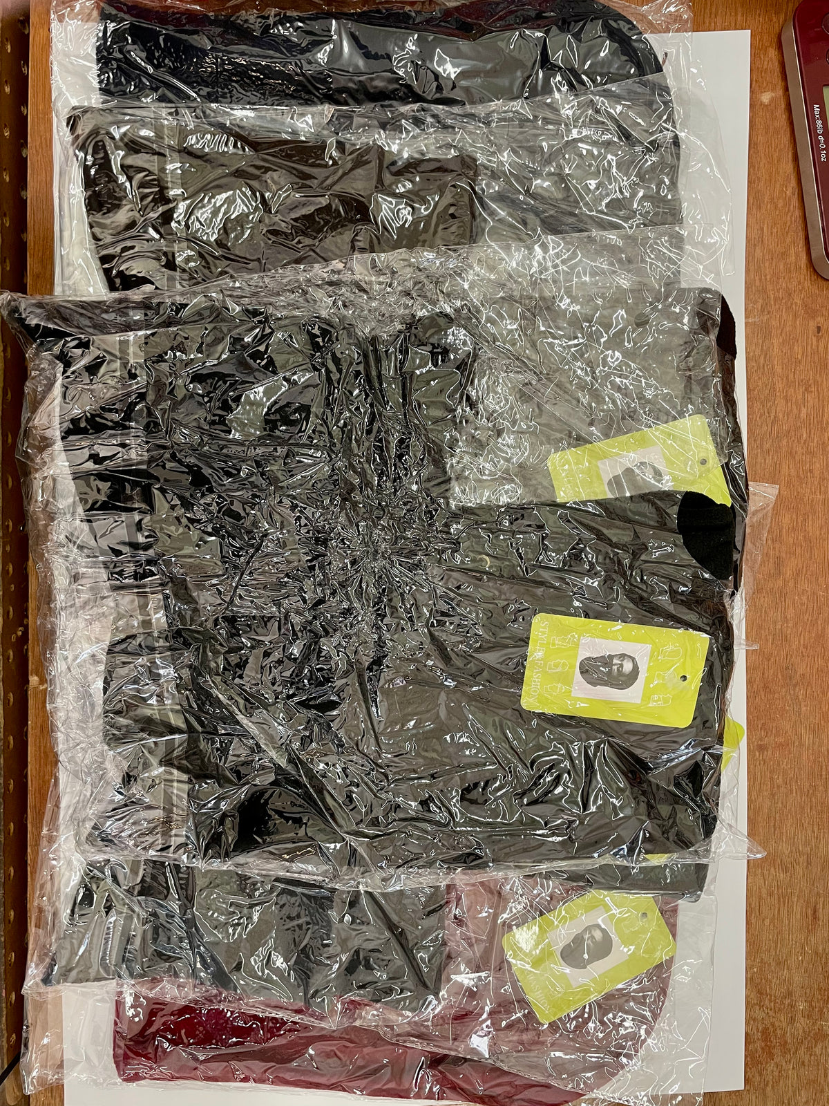 Packaged face-covering hoods in several colors