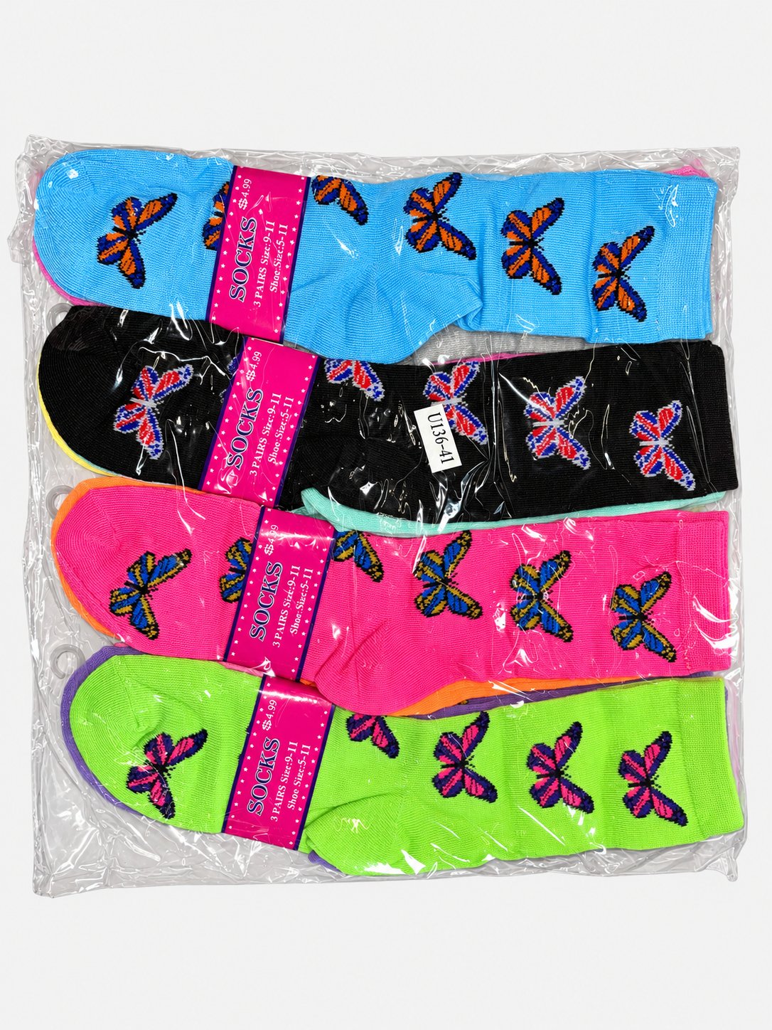 Packaged women’s crew socks with butterfly patterns