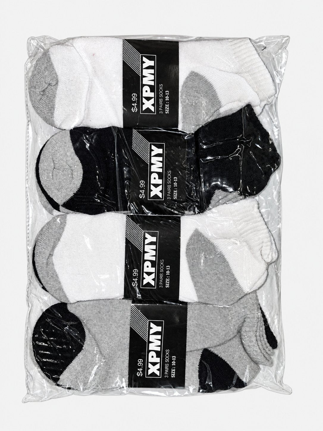 Packaged white, black and gray men’s ankle socks