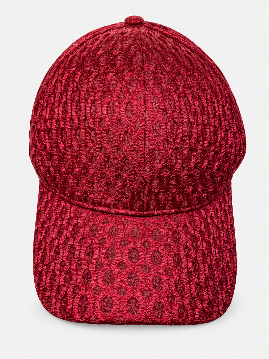 Burgundy netted baseball cap with oval pattern on a light gray background